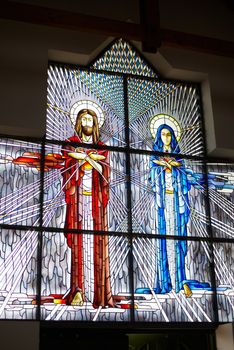 Stained glass in Chapel in Suodziai village. Lithuania. Roman Catholic church. Stained glass in Chapel in Suodziai village. Lithuania. Roman Catholic church.