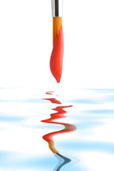 Stock photo: an image of a brush with red paint on it
