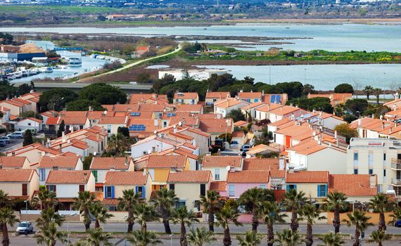 View of the gated community on the shore of the sea, sunny day