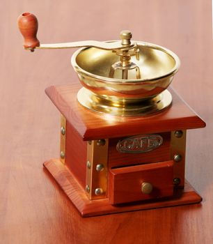 An image of antique coffee mill