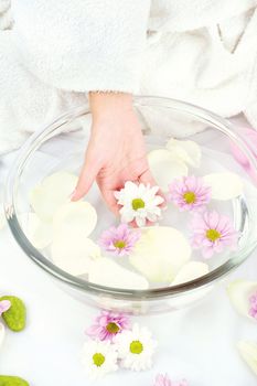 Spa composition with one woman's hand