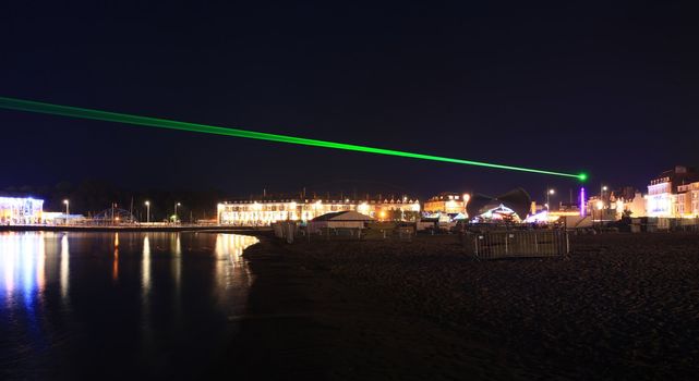 Lazer show over weymouth seafront a feature built for the 2012 olympics