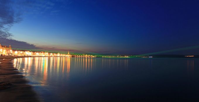 Lazer show over weymouth seafront a feature built for the 2012 olympics