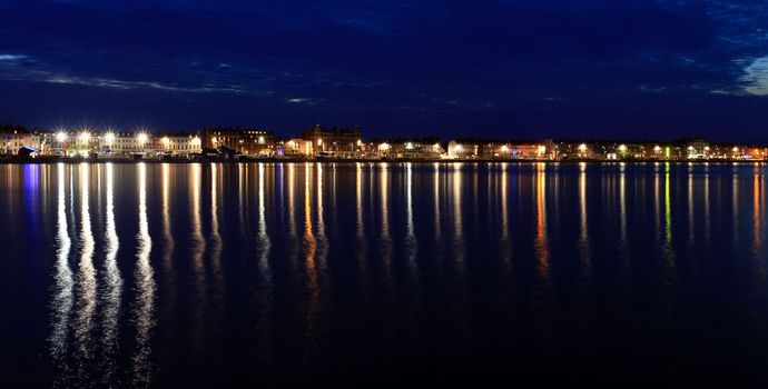 Weymouth seafront at dusk in dorset england