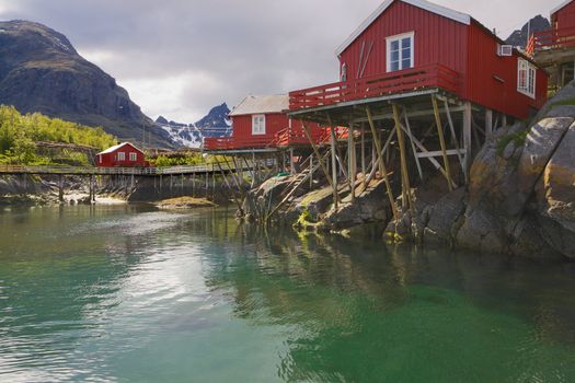 Typical red fishing huts Rorbu on Lofoten islands in Norway