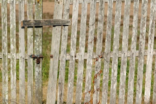 old wooden fence with a gate 