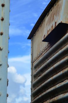 Old container train carriages with sky background