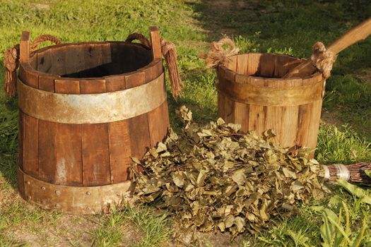 old wooden buckets on the grass