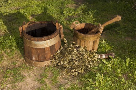 old wooden buckets on the grass