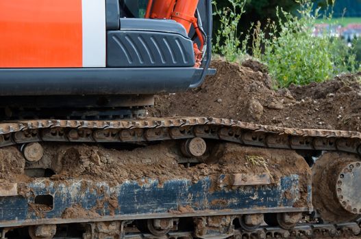 Closeup of heavy duty construction equipment at a construction site