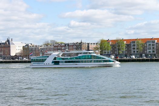 Tourist boat on the river Maas in Rotterdam. Netherlands