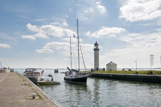 the lighthouse in the harbour in holland called Hellevoetsluis