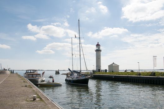 the lighthouse in the harbour in holland called Hellevoetsluis