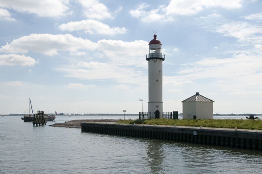 the lighthouse in the harbour in holland called Hellevoetsluis