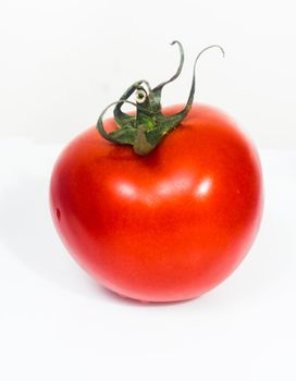 Fresh tomato, isolated on white background