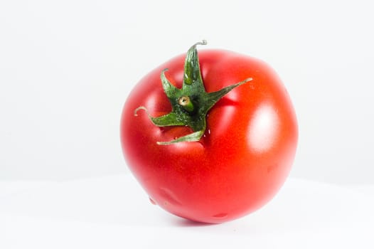 Fresh tomato, isolated on white background