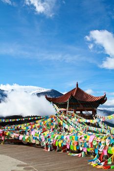 Colorful prayer flags and clear blue sky