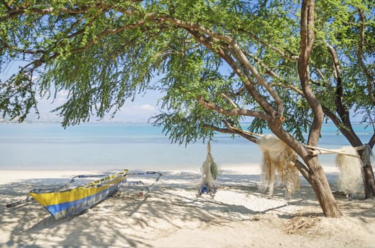 fishing boat on beach in dili east timor, timor leste