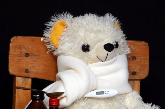 An image of bear with pills and mixture