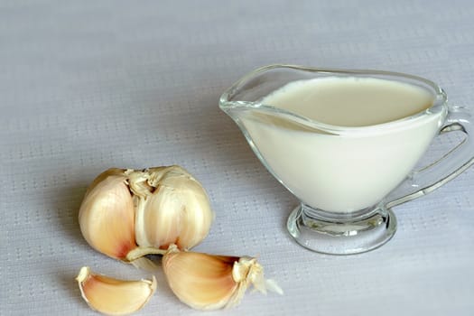 An image of souce and garlic