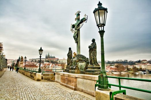 An image of a monument on the bridge in Prague