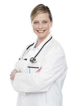 Female medical specialist posing with crossed arms isolated over white background