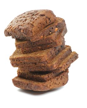 Stack of Brown 7-Grain Bread Slices close up on white background
