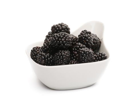 Perfect Blackberries in White Bowl isolated on white background 