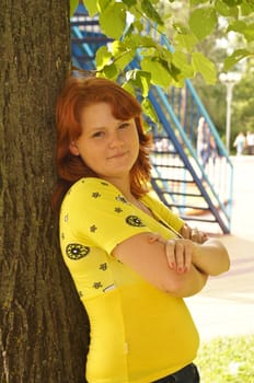 The young cheerful girl on walk