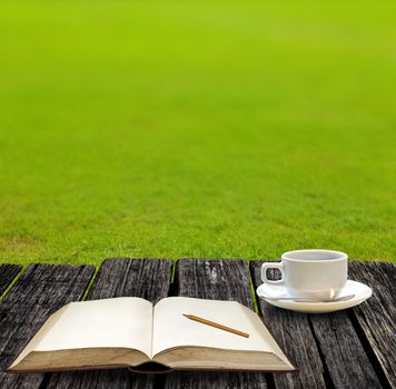 Rest for write on note book and drink hot coffee on garden
