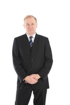 Relaxed fashionable middle-aged businessman with folded hands standing facing the camera isolated on white Relaxed fashionable middle-aged businessman with folded hands standing fcaing the camera isolated on white 