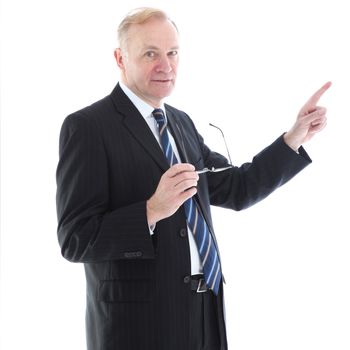 Middle-aged businessman pointing off frame with his index finger isolated on white 