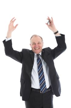 Jubilant middle-aged businessman with a wide smile and his arms raised above his head to show his elation 