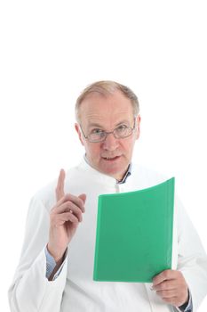 Pathologist or research scientist wearing a white labcoat and holding a folder discussing his results with his finger raised emphasising a point 