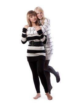 Two friends in striped jackets cuddling on white background
