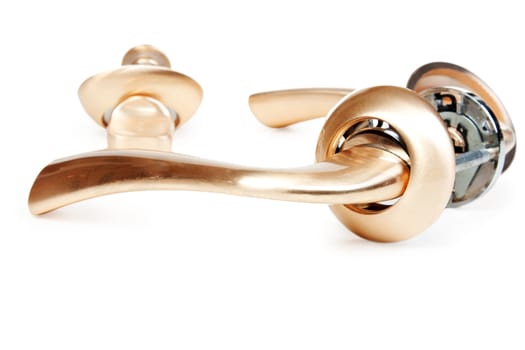 The bronze door handle is isolated on a white background
