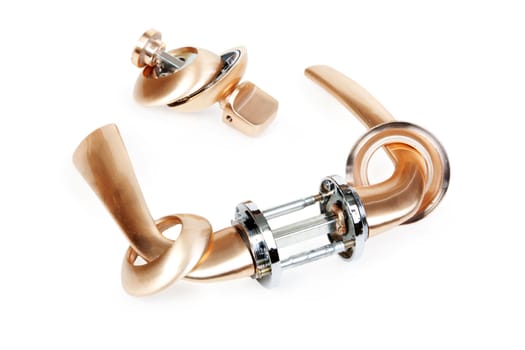 The bronze door handle is isolated on a white background
