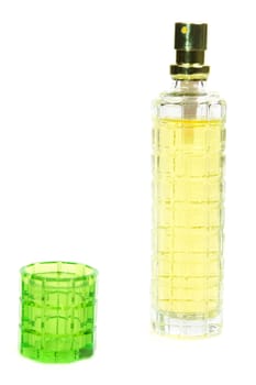 Yellow perfume bottle isolated on white background