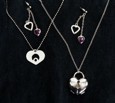 Necklace with sparkling stones on dark fabric