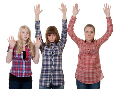 three friends raised their hands up on a white background