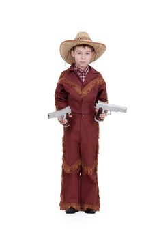 boy dressed as a cowboy with pistols on a white background