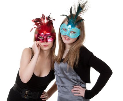 two girl in the masquerade mask on a white background