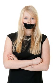 beautiful girl with her mouth sealed with black tape