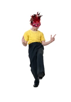 boy in a red mask with feathers on a white background