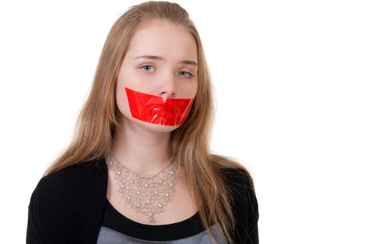 beautiful girl with her mouth sealed with red tape