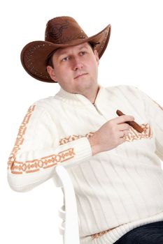 Portrait of a man in a cowboy hat and a cigar