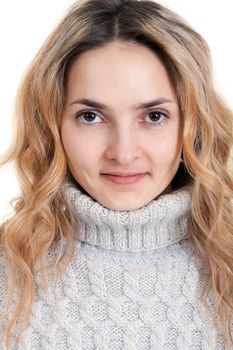 portrait of a beautiful blonde girl on a white background