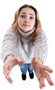 plaintively beautiful blonde pulls her hands on a white background