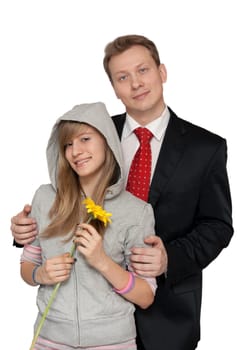 Dad in a suit and tie with a teenage daughter