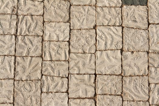 The stone floor of the square pieces